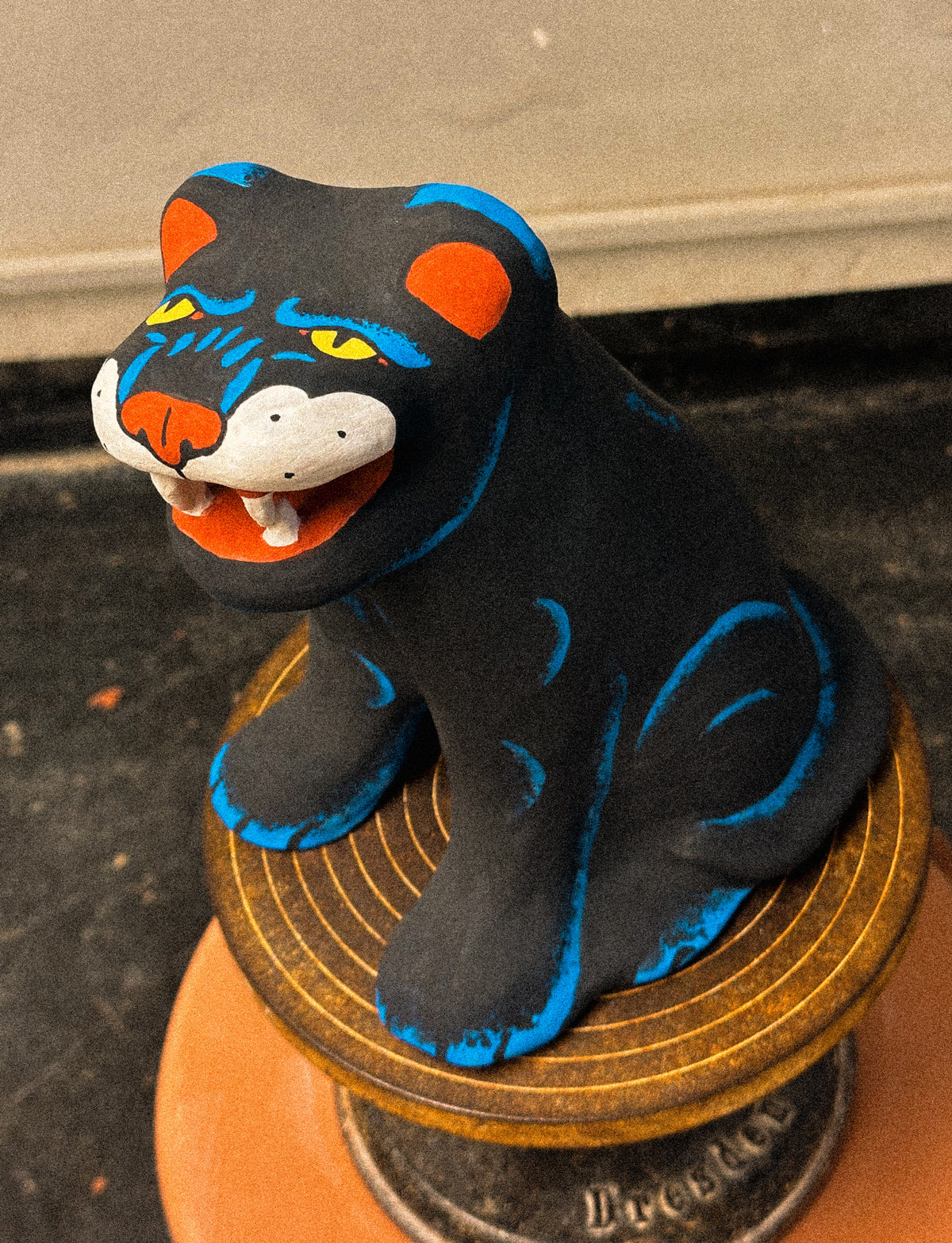 Black stoneware panther with blue lines by Julia Staflund